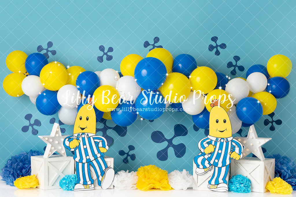 Bananas and their Pyjamas - Lilly Bear Studio Props, balloon, balloon arch, balloon garland, bananas, blue, flowers, white balloon arch, white balloons, yellow, yellow and blue