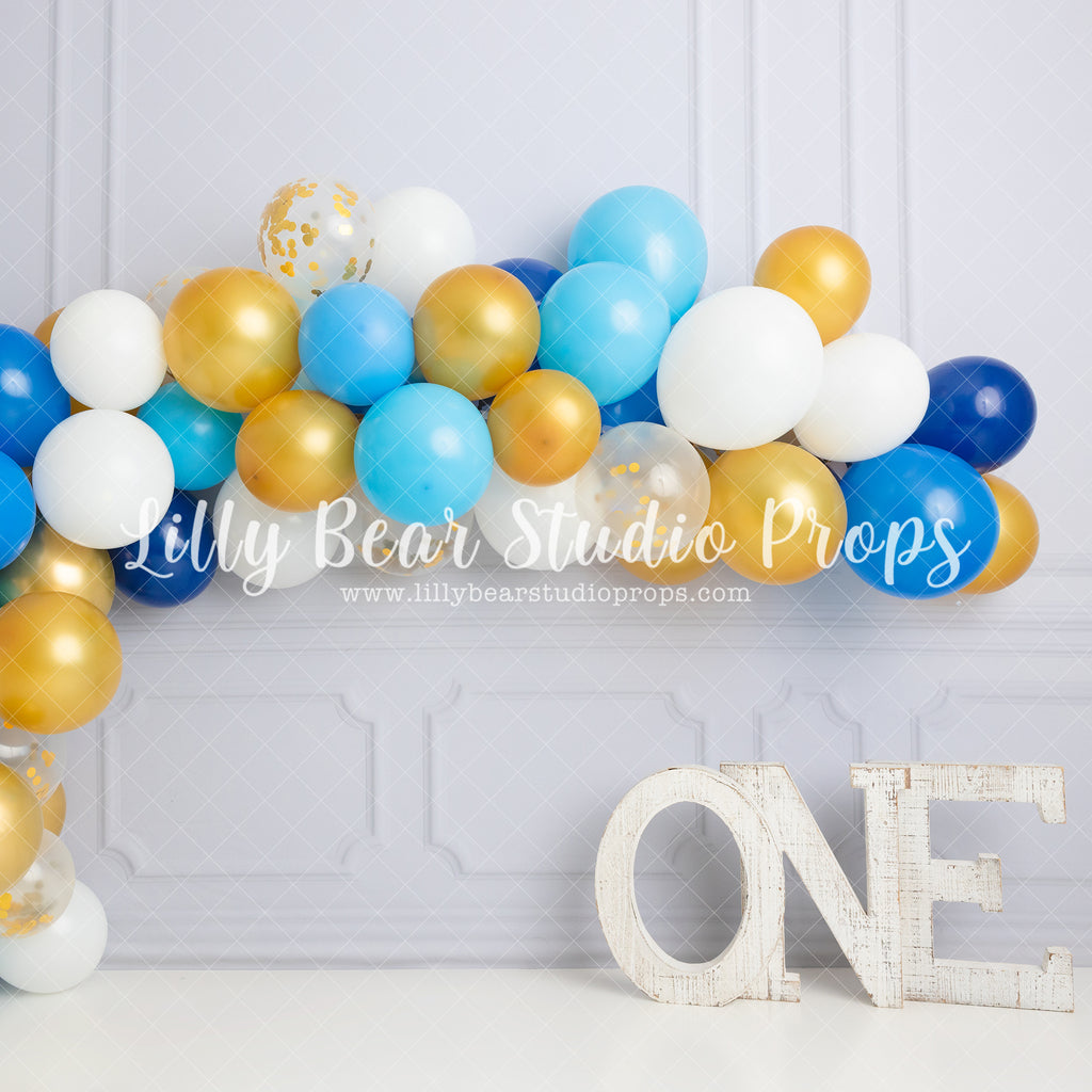 Blue Gold Wainscott Wall-ONE - Lilly Bear Studio Props, balloon garland, blue balloon garland, blue balloons, blue boy, boy, boy balloon garland, boy birthday, Fabric, FABRICS, garland, gold balloons, molding, ONE, wainscotting wall, white balloons, Wrinkle Free Fabric