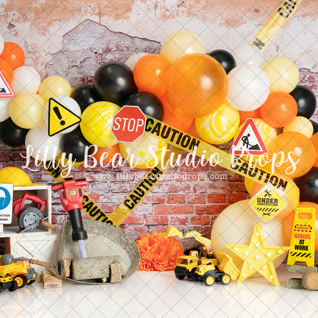 C is for Construction - Lilly Bear Studio Props, balloon garland, building, building blocks, caution tape, construction, construction workers, digger, dump truck, little digger, orange yellow and black balloons, silver star, stars, white stars, yellow tape