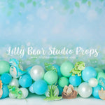 Dino Hatch - Lilly Bear Studio Props, blue floral, blue flowers, blue rainbow, dino, dino balloons, dino eggs, dino forest, Dino-roars, dinosaur, Fabric, jurassic, Jurassic park, little dino, pastel, pastel balloon garland, pastel balloons, pastel blue, pastel green, pastel wall, Wrinkle Free Fabric