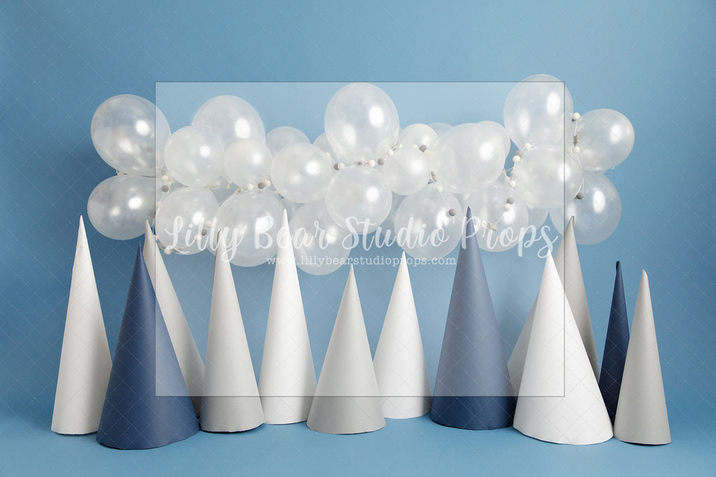 Party Hats - Lilly Bear Studio Props, balloon, balloon arch, balloon garland, blue, blue balloon, blue balloon garland, blue balloons, chrome balloon, metallic balloon, snow, snowy forest, snowy peaks, snowy trees, winter one derland, winter onederland