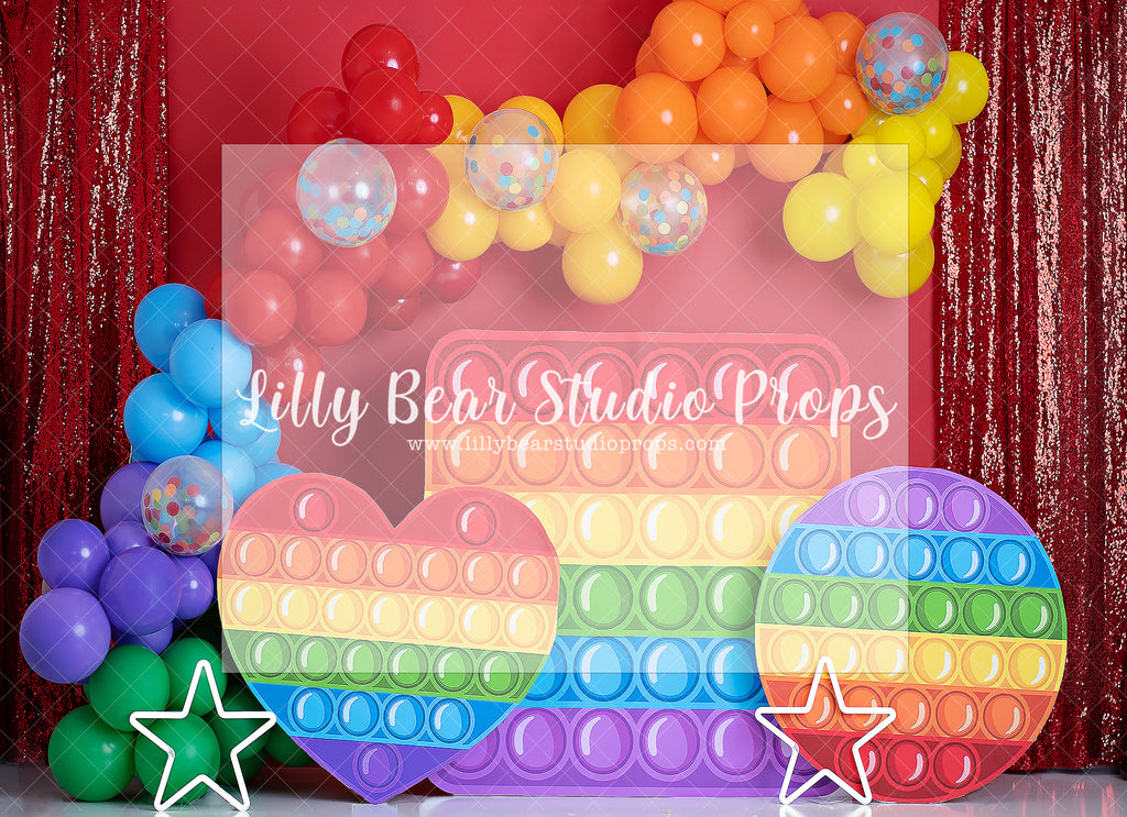 Pop It Party - Lilly Bear Studio Props, balloon rainbow, colourful rainbow, colours of the rainbow, fidget, fidget toys, over the rainbow, pop it toy, rainbow, rainbow baby, rainbow balloon, rainbow balloons, rainbow fidget, rainbow garland, rainbow pop it, rainbow wall, toys