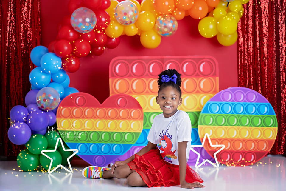 Pop It Party - Lilly Bear Studio Props, balloon rainbow, colourful rainbow, colours of the rainbow, fidget, fidget toys, over the rainbow, pop it toy, rainbow, rainbow baby, rainbow balloon, rainbow balloons, rainbow fidget, rainbow garland, rainbow pop it, rainbow wall, toys