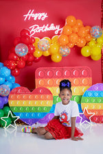 Pop It Party - Lilly Bear Studio Props, balloon rainbow, colourful rainbow, colours of the rainbow, fidget, fidget toys, over the rainbow, pop it toy, rainbow, rainbow baby, rainbow balloon, rainbow balloons, rainbow fidget, rainbow garland, rainbow pop it, rainbow wall, toys