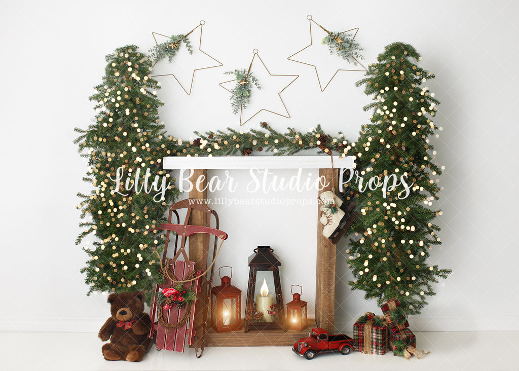 Starry Christmas Mantle - Lilly Bear Studio Props, christmas fireplace, christmas mantel, christmas trees, fireplace, garland, holiday fireplace, lantern, mantel, red pickup, sled, star garland, stars, teddy bear, winter