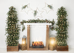 Warm Starry Mantle - Lilly Bear Studio Props, bohemian fireplace, boho fireplace, boho fireplaced, christmas fireplace, christmas garland, christmas mantel, christmas tree, christmas trees, fireplace, garland, holiday christmas, holiday fireplace, lanterns, mantel, simple fireplace, stars, trees, white mantel, winter